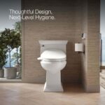Kohler PureWash E750 Elongated Bidet Seat with Touchscreen Remote Control with Two Programmable User Presets, Continuously Heated Water, Front and Rear Wash Modes, Adjustable Water Temperature and Pressure, Automatically UV Light Self-Cleaning Stainless Steel Wand, Heated Seat, Warm-air Drying System, Carbon Filter, and LED Nightlight Technology White